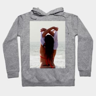 Girl at the beach getting ready for a bath Hoodie